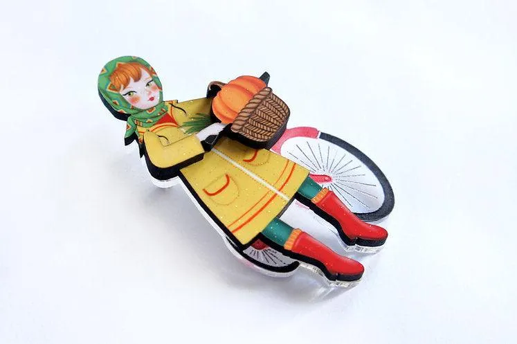 Girl with bicycle brooch by Laliblue